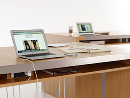 A Laptop Placed on the Table Image